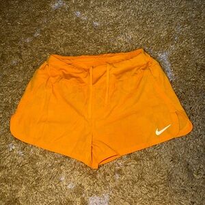 Nike Women's Bright Orange Athletic Shorts